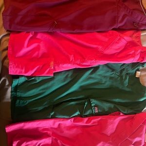 4 scrub tops all size XL